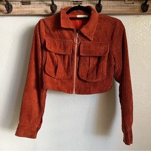 Orange suede material zip up jacket size Medium